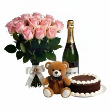 Bouquet rosa con spumante, torta al cioccolato e orsacchiotto (Raffinato)