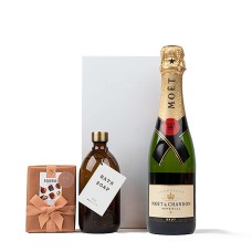 Champagne Moet, sapone da bagno Wellmark e cioccolatini Neuhaus
