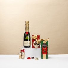 Elegante confezione regalo con champagne Moët & Chandon e cioccolatini al Porto Corne Royal.