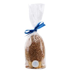 Uovo di cioccolato fondente e pezzetti di Prasline, guarnito con uova, statuine e Prasline