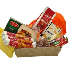Cestino di caramelle belghe con biscotti, cioccolato e torrone