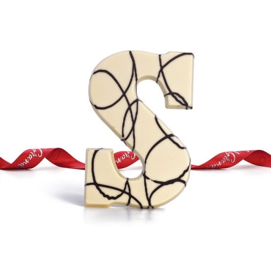 Lettera di cioccolato di lusso bianca con strisce pure